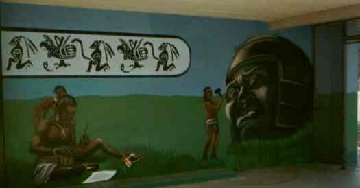 Over by the wood shop, south end of hall.